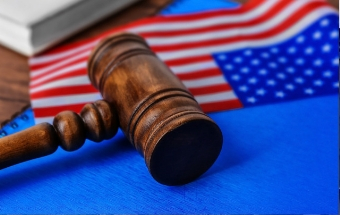 American flag and courtroom gavel